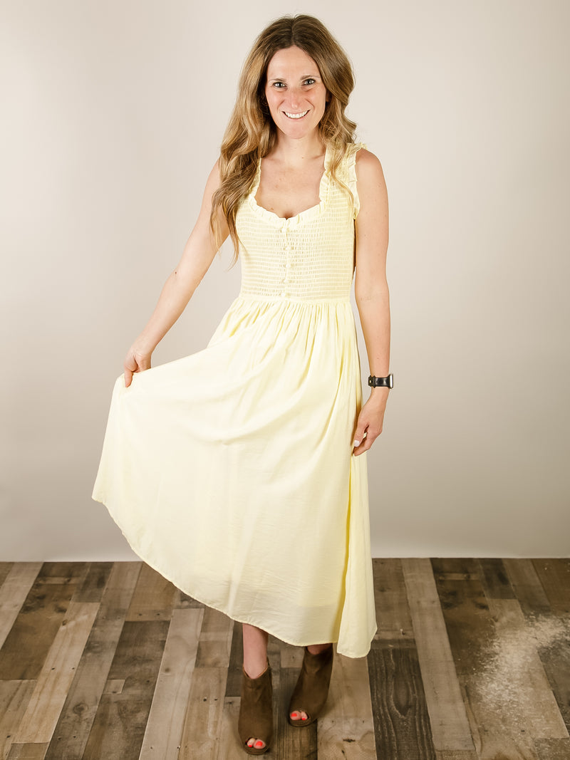 butter yellow midi dress Colorado Shes designed with a shirred bodice and short puff sleeves in soft butter yellow cotton. Layla Dress-Butter Yellow medium