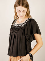 Black with White Embroidered Top